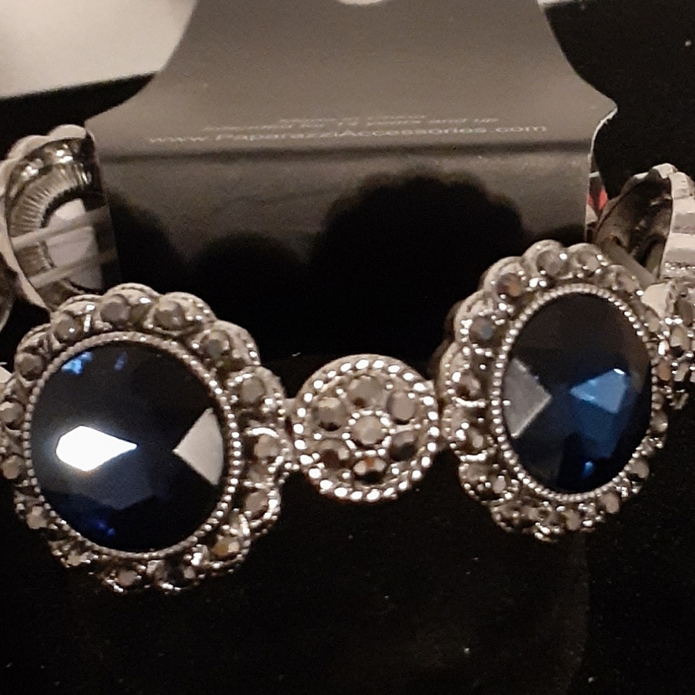 Silvertone bracelet with deep blue rhinestones